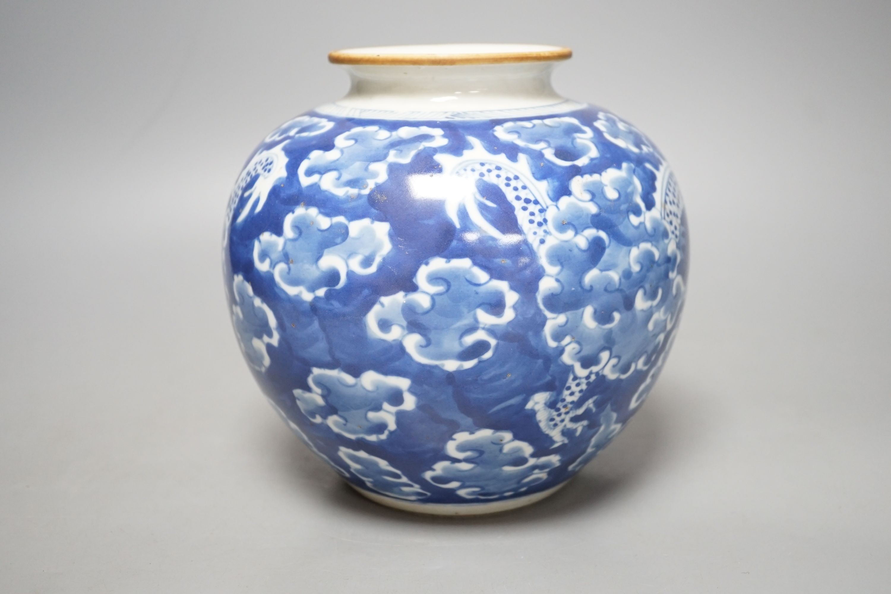 A Chinese blue and white ‘dragon’ globular vase, 17cms high.